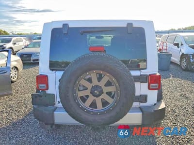 Zdjęcie 6 z 12 samochodu: 2015 JEEP WRANGLER UNLIMITED SAHARA VIN:1C4BJWEG0FL504456 - miniatura