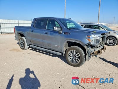 Czwarte zdjęcie samochodu z boku: 2020 GMC SIERRA K1500 AT4 VIN:3GTP9EELXLG425312 - miniatura