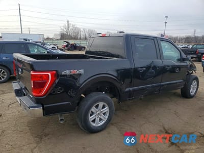 Trzecie zdjęcie samochodu z tyłu: 2023 FORD F150 SUPER VIN:1FTFW1E82PFA35353 - miniatura