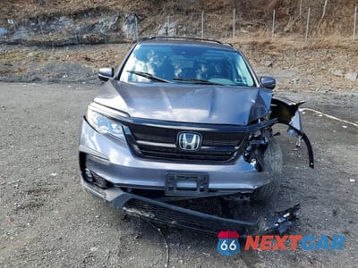 Piąte zdjęcie samochodu w środku: 2021 HONDA PILOT SE VIN:5FNYF6H28MB067575 - miniatura
