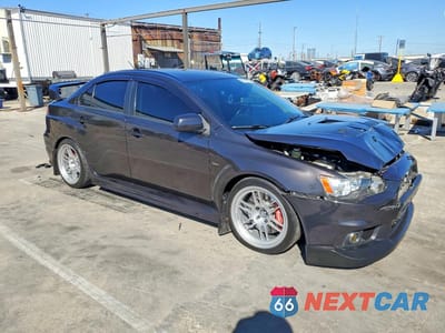 Czwarte zdjęcie samochodu z boku: 2011 MITSUBISHI LANCER EVOLUTION GSR VIN:JA32W8FV1BU043068 - miniatura