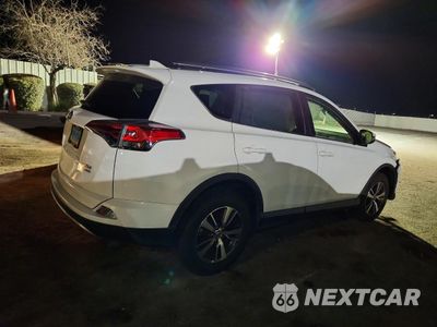 Trzecie zdjęcie samochodu z tyłu: 2018 TOYOTA RAV4 XLE VIN:JTMRFREV6JJ730053 - miniatura