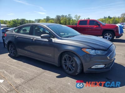 Czwarte zdjęcie samochodu z boku: 2018 FORD FUSION SE HYBRID VIN:3FA6P0LU7JR169847 - miniatura