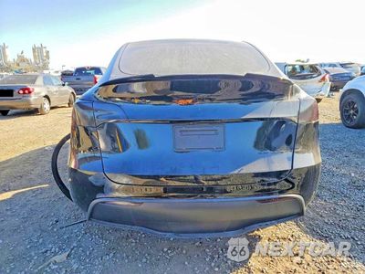 Zdjęcie 6 z 14 samochodu: 2023 TESLA MODEL Y VIN:7SAYGAEEXPF706867 - miniatura