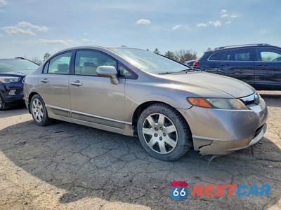Czwarte zdjęcie samochodu z boku: 2006 HONDA CIVIC LX VIN:2HGFA16526H502451 - miniatura