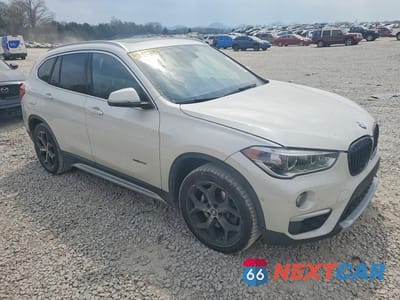 Czwarte zdjęcie samochodu z boku: 2017 BMW X1 SDRIVE28I VIN:WBXHU7C36H5H38704 - miniatura