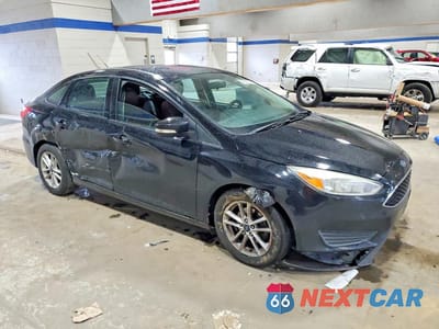 Czwarte zdjęcie samochodu z boku: 2016 FORD FOCUS SE VIN:1FADP3F21GL313029 - miniatura