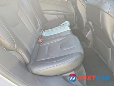 Zdjęcie 10 z 12 samochodu: 2016 FORD FUSION TITANIUM PHEV VIN:3FA6P0SU7GR106824 - miniatura