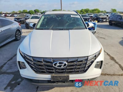 Piąte zdjęcie samochodu w środku: 2022 HYUNDAI TUCSON SEL VIN:5NMJF3AE4NH115609 - miniatura