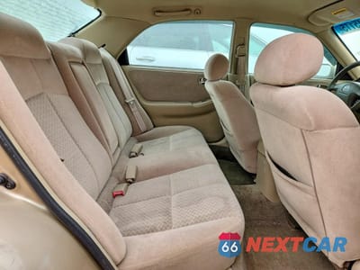 Zdjęcie 10 z 13 samochodu: 2001 MAZDA 626 ES VIN:1YVGF22CX15214105 - miniatura