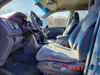 Zdjęcie 7 z 13 samochodu: 2003 HONDA PILOT EX VIN:2HKYF184X3H577107 - miniatura