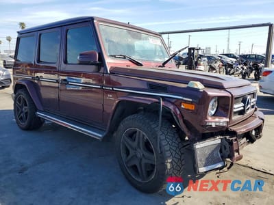 Czwarte zdjęcie samochodu z boku: 2015 MERCEDES-BENZ G 63 AMG VIN:WDCYC7DFXFX233671 - miniatura