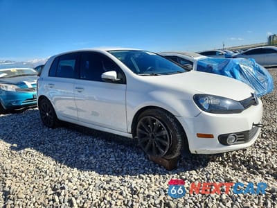 Czwarte zdjęcie samochodu z boku: 2014 VOLKSWAGEN GOLF VIN:WVWDM7AJ8EW000063 - miniatura