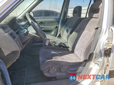 Zdjęcie 7 z 11 samochodu: 1999 HONDA CR-V LX VIN:JHLRD1841XC070790 - miniatura