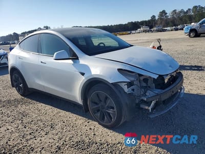 Czwarte zdjęcie samochodu z boku: 2023 TESLA MODEL Y VIN:7SAYGDEE4PA139375 - miniatura