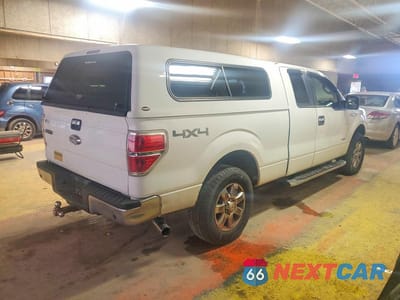 Trzecie zdjęcie samochodu z tyłu: 2014 FORD F150 SUPER CAB VIN:1FTFX1ET9EFA61074 - miniatura