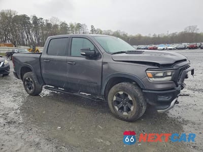 Czwarte zdjęcie samochodu z boku: 2019 RAM TRUCKS 1500 REBEL VIN:1C6SRFLTXKN661815 - miniatura