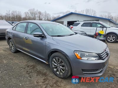 Czwarte zdjęcie samochodu z boku: 2015 VOLKSWAGEN PASSAT S VIN:1VWAT7A36FC059846 - miniatura