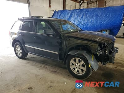 Czwarte zdjęcie samochodu z boku: 2009 JEEP GRAND CHEROKEE LIMITED VIN:1J8HR58T59C530859 - miniatura