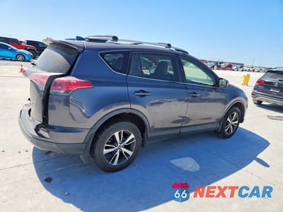 Trzecie zdjęcie samochodu z tyłu: 2018 TOYOTA RAV4 XLE VIN:JTMWFREV4JJ742026 - miniatura