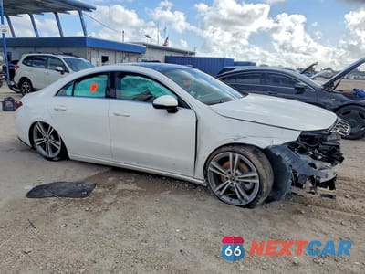 Czwarte zdjęcie samochodu z boku: 2021 MERCEDES-BENZ CLA 250 VIN:W1K5J4GB1MN217573 - miniatura