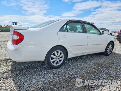 Trzecie zdjęcie samochodu z tyłu: 2002 TOYOTA CAMRY XLE V6 VIN:JTDBF30KX20016428 - miniatura
