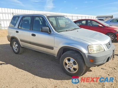 Czwarte zdjęcie samochodu z boku: 1999 HONDA CR-V LX VIN:JHLRD1841XC070790 - miniatura