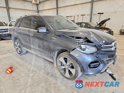Czwarte zdjęcie samochodu z boku: 2016 MERCEDES-BENZ GLE 350 4MATIC VIN:4JGDA5HB0GA764965 - miniatura