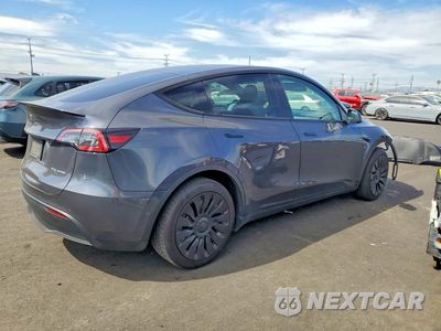 Trzecie zdjęcie samochodu z tyłu: 2022 TESLA MODEL Y VIN:7SAYGDEE3NF409650 - miniatura
