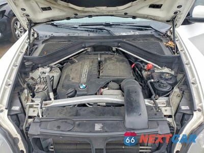 Zdjęcie 12 z 13 samochodu: 2013 BMW X5 XDRIVE35I VIN:5UXZV4C54D0B02223 - miniatura