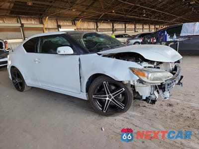 Czwarte zdjęcie samochodu z boku: 2014 SCION TC BASE VIN:JTKJF5C75E3082704 - miniatura