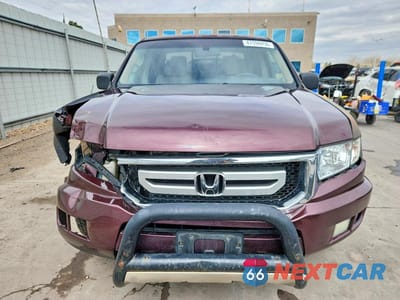 Piąte zdjęcie samochodu w środku: 2010 HONDA RIDGELINE RTL VIN:5FPYK1F53AB012630 - miniatura