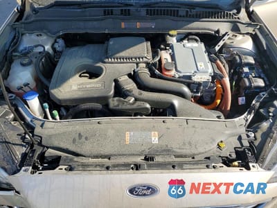 Zdjęcie 11 z 12 samochodu: 2017 FORD FUSION SE HYBRID VIN:3FA6P0LUXHR357059 - miniatura