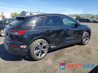 Trzecie zdjęcie samochodu z tyłu: 2024 AUDI Q4 E-TRON PRESTIGE VIN:WA1MUBFZ8RP048027 - miniatura