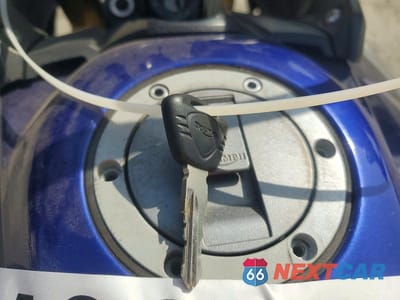 Zdjęcie 8 z 9 samochodu: 2013 TRIUMPH MOTORCYCLE TIGER 800 VIN:SMTE05BF5DT577214 - miniatura