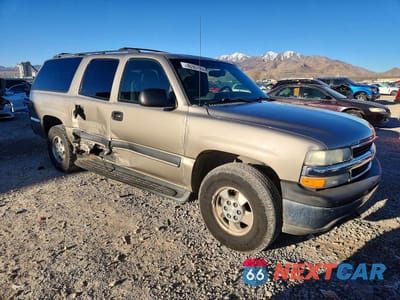 Czwarte zdjęcie samochodu z boku: 2002 CHEVROLET SUBURBAN K1500 VIN:1GNFK16Z82J270632 - miniatura