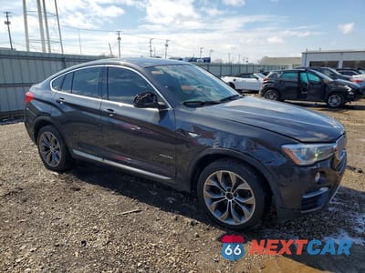 Czwarte zdjęcie samochodu z boku: 2015 BMW X4 XDRIVE28I VIN:5UXXW3C51F0F89320 - miniatura