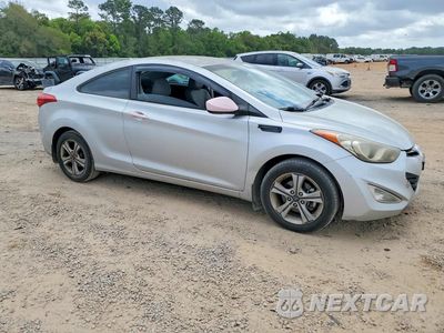 Czwarte zdjęcie samochodu z boku: 2013 HYUNDAI ELANTRA COUPE GS VIN:KMHDH6AE8DU004802 - miniatura