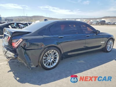 Trzecie zdjęcie samochodu z tyłu: 2015 BMW 750 LXI VIN:WBAYF8C57FD654550 - miniatura