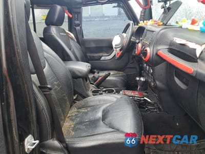 Zdjęcie 7 z 11 samochodu: 2016 JEEP WRANGLER UNLIMITED RUBICON VIN:1C4HJWFG1GL208484 - miniatura