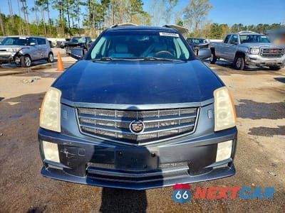 Piąte zdjęcie samochodu w środku: 2009 CADILLAC SRX VIN:1GYEE437690109934 - miniatura
