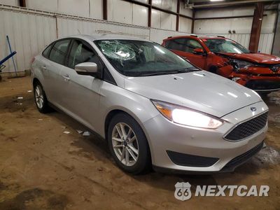 Czwarte zdjęcie samochodu z boku: 2018 FORD FOCUS SE VIN:1FADP3FE9JL216274 - miniatura