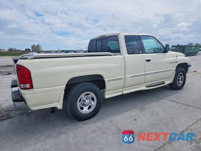 Trzecie zdjęcie samochodu z tyłu: 1999 DODGE RAM 1500 VIN:3B7HC12Y6XG100564 - miniatura