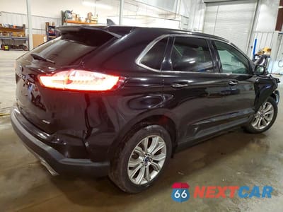 Trzecie zdjęcie samochodu z tyłu: 2022 FORD EDGE TITANIUM VIN:2FMPK4K92NBB05832 - miniatura