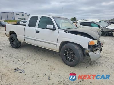 Czwarte zdjęcie samochodu z boku: 2001 GMC NEW SIERRA C1500 VIN:2GTEC19T111177310 - miniatura