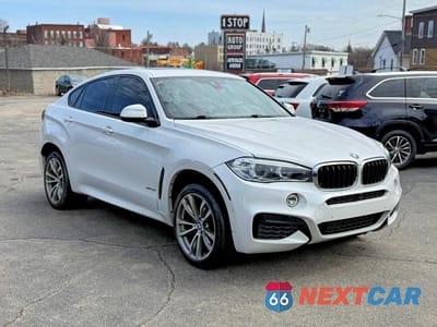 Czwarte zdjęcie samochodu z boku: 2018 BMW X6 XDRIVE35I VIN:5UXKU2C52J0Z61909 - miniatura