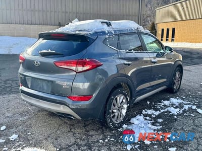 Czwarte zdjęcie samochodu z boku: 2017 HYUNDAI TUCSON ECO VIN:KM8J3CA23HU337808 - miniatura