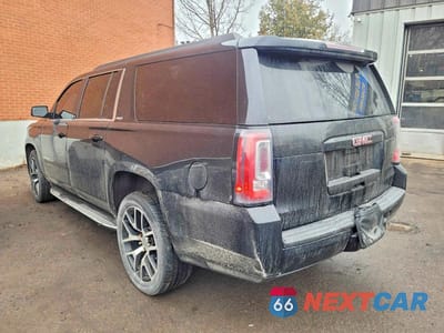 Trzecie zdjęcie samochodu z tyłu: 2017 GMC YUKON XL K1500 SLE VIN:1GKS2FKC3HR139094 - miniatura
