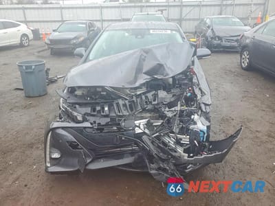 Piąte zdjęcie samochodu w środku: 2017 TOYOTA PRIUS PRIME ADVANCED VIN:JTDKARFP9H3059251 - miniatura