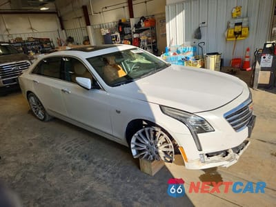 Czwarte zdjęcie samochodu z boku: 2018 CADILLAC CT6 PREMIUM LUXURY CSAV VIN:1G6KG5RS4JU155931 - miniatura